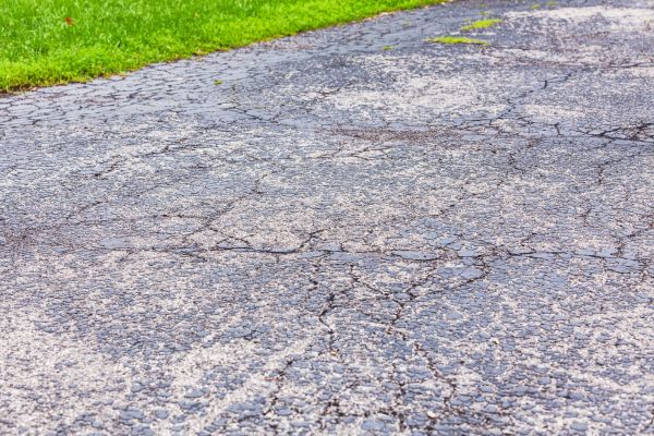 Signs Your Asphalt Driveway Needs Resurfacing - Donovan Sealcoating