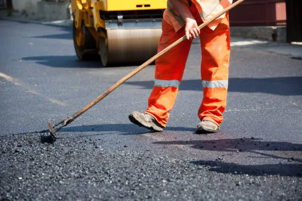 professional contractors doing asphalt paving