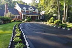 a two-story home in Massachusetts with new and long lasting driveway